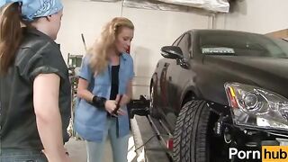Two lesbians have fun with each other in a garage, licking pussies