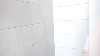 A man secretly films his step sister as she takes shower