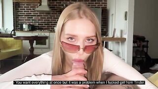 A sexy girl in glasses gets a cumshot right on her face