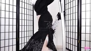 2B's android body examined by plugging holes in a suggestive way