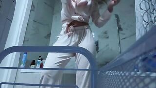 A petite girl masturbates her pussy in the bathroom, craving no one’s attention