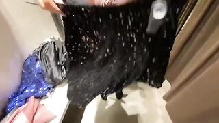 The girl chose a new outfit in the fitting room and got a cumshot on her boobs