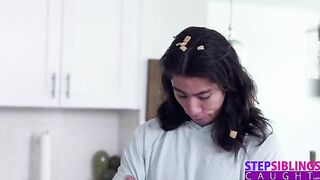 The guy is fucking with the sexy stepsister Kyler Quinn in the kitchen