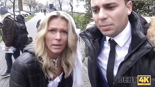 The collector has sex with a blonde in front of her future husband, showcasing debt repayment