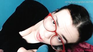 A redhead nerd gets fucked by a gorgeous woman while her mother is nearby