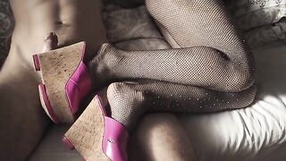 A hot chick in sexy high heels and stockings