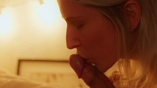 The wife gently massages her husband's body before they have sex