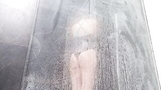 A woman has a wet pussy orgasm in the shower after masturbating