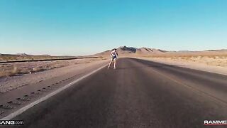A girl is having fun with her boyfriend on a skateboard