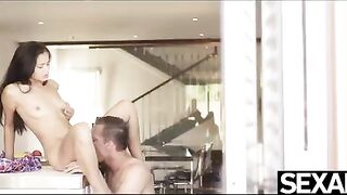 The woman was fucked over the kitchen counter, showcasing intense passion