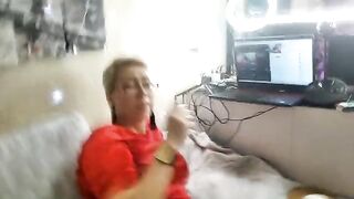 A mature woman plays sexual games with her husband, showcasing real passion
