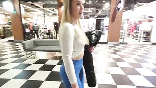 A hot blonde with a big ass is fucking in the shopping mall toilet for cash