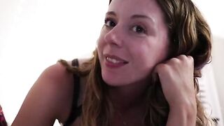 A girl reads erotic literature while getting fucked by a huge cock