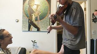 The couple was trying to practice violin but ended up making love