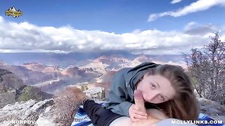 Amateur couple having sex on top of the cliff during a hike