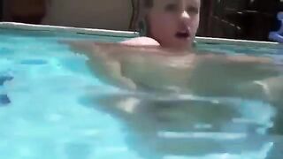 Babe in sexy bikini fucks with a dildo underwater