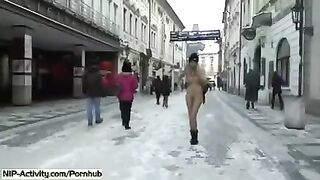 A student bares her boobs and ass on the city streets
