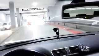 A blowjob from an appetizing girl while the guy is driving in the car