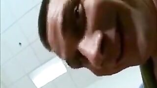 The man masturbates his cock with the feet of a porn star