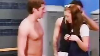 A cute schoolgirl got caught in a locker room by two guys