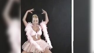 A beautiful Russian is dancing and showing her body