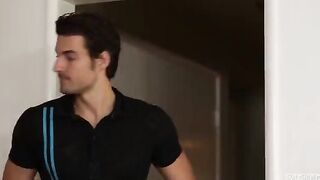 A handsome man fucks a sexy mulatto in a condom on the couch