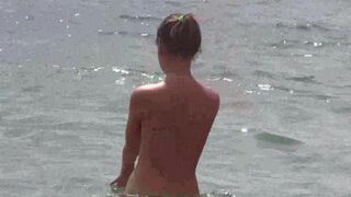 Nudist beach where everyone is completely naked and free