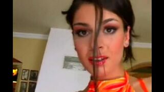 Beautiful woman masturbates on a leather chair and reaches a strong orgasm