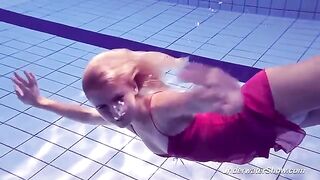 Helen took a dip in the pool without swimming suit