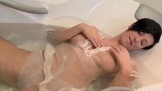 Lonely brunette woman masturbating in the shower