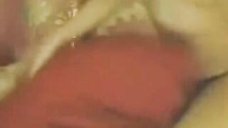 An Asian woman masturbates in front of her webcam, showcasing her sensual side
