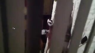 Shooting a hidden camera while his neighbors have sex