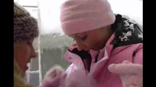 Two lesbians enjoy the cold winter day
