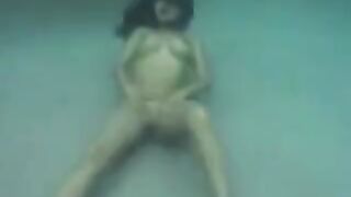 Sex in the ocean with busty brunette, a sight to behold
