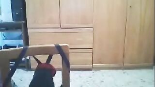 A woman fucks in front of her webcam and her husband