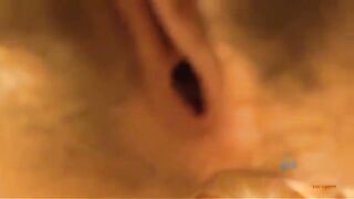 A man gets his dick sucked by a woman in a glory hole