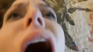 A man gets his dick sucked by a woman in a glory hole