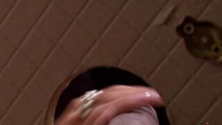 A beautiful woman sucked a cock through a hole in the toilet bowl