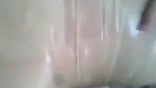 Putting a condom on the dick and masturbating with your hand