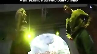A hot girl is fucking in front of all the people in the club