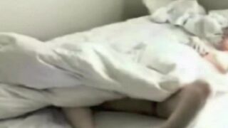 A girl was captured masturbating in the bedroom with a hidden camera