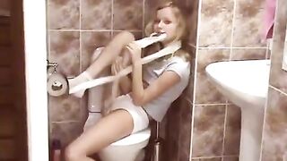 A young naive blonde in the toilet has an unexpected sexual encounter