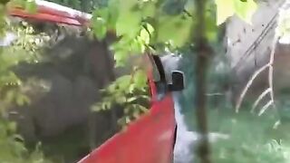 The man compressed the girl's breasts by a car and fucked her