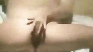 A girl caressed herself on the beach and was recorded by a hidden camera
