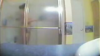 A girl took shower, not knowing that there was a secret camera filming her