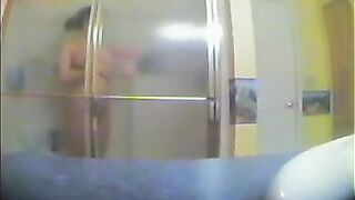 A girl took shower, not knowing that there was a secret camera filming her