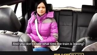 A hot girl is having fun with taxi driver in his car