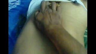 The husband makes a massage for her nipples himself
