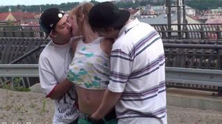 An amateur brunette has sex with two guys in an amateur video