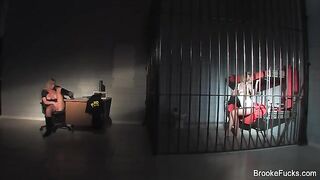 The guard caresses herself with her gun at work